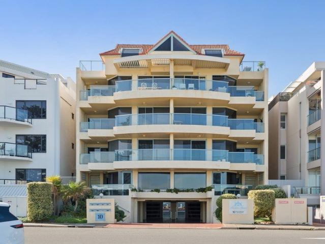 Absolute Beachfront Elegance with Uninterrupted Coastal Views