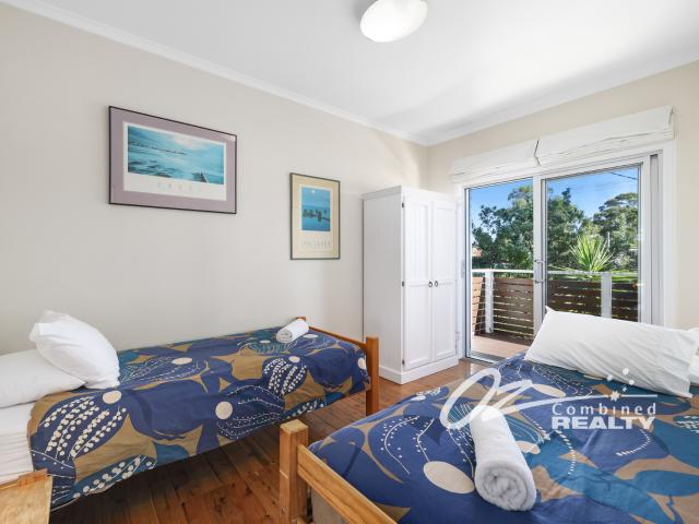 Absolute beachfront fully furnished potential high income yields breathtaking beach and bay views