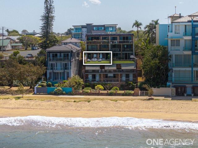 Absolute beachfront in dress circle location with no road in front of your view