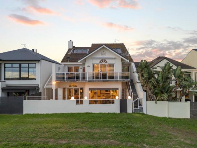 Absolute Beachfront Luxury with Private Marina Berth