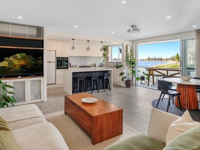 Absolute beachfront living