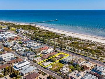 Absolute Beachfront Living on a Grand 937sqm Allotment with Dual Access.