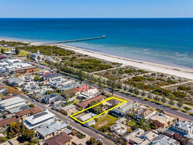 Absolute Beachfront Living on a Grand 937sqm Allotment with Dual Access.