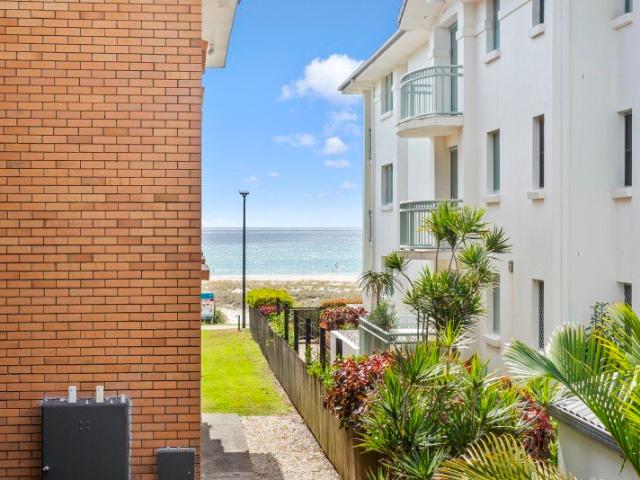 Absolute Beachfront Living Rare Opportunity on Golden Four Drive