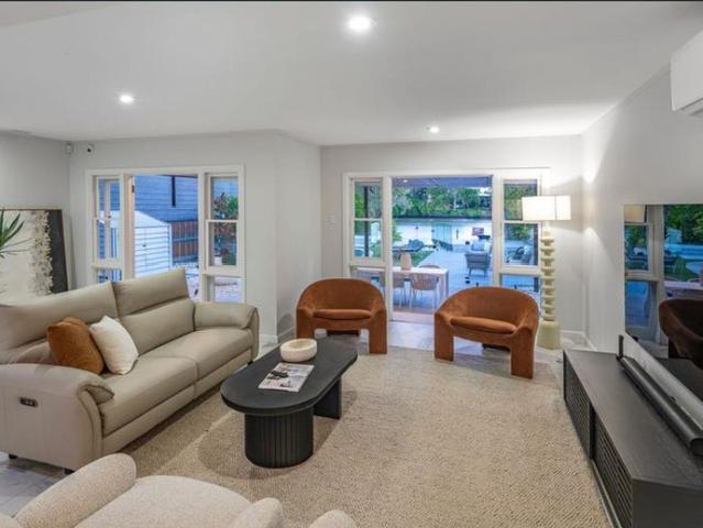 ABSOLUTE RIVERFRONT LUXURY WITH POOL & PRIVATE PONTOON FULLY FURNISHED!