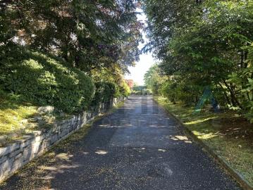 Agra – Collina d'Oro Geräumige 4,5 Zimmer Wohnung inmitten einer grün