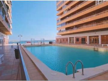ADOSADO EN PLAYA FLAMENCA CON PISCINAS, SAUNA Y TERRAZAS