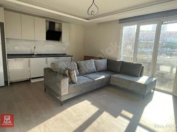 ADA'danMAVİEVLER'DE724 GÜVELİKLİ SİTEDEFULL EŞYALILÜKS YAPILI, KATTA ÖN CEPHELİ 1+1
