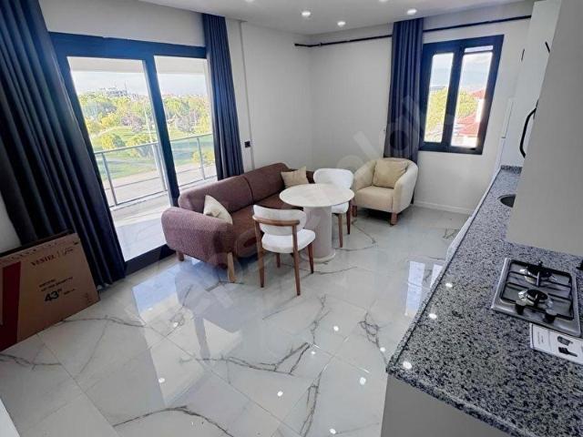 ADLİYE PARKI DİBİNDE SIFIR AİDAT DAHİL APARTLAR !