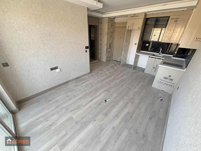 ADRES GAYRİMENKUL DEN X YAPIDA ARA KAT 1+1 SATILIK DAİRE