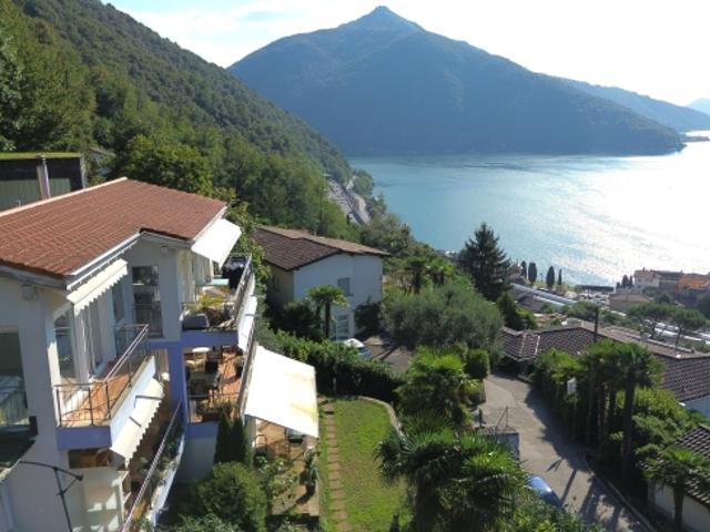 Affascinante casa indipendente da 4.5 locali con vista lago e potenziale di espansione a Bissone