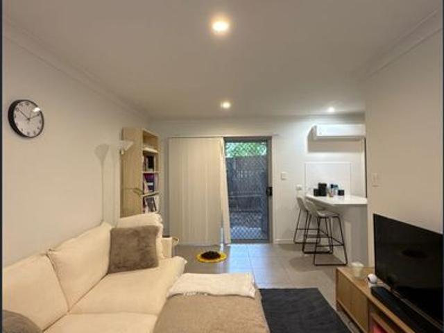 Affordably priced three bedroom, two bathroom unit within landscaped housing complex