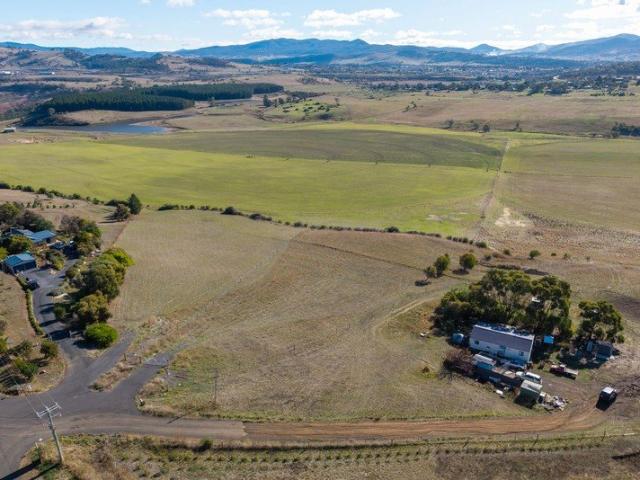 Affordable acreage home with valley views