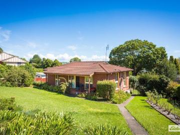 AFFORDABLE BRICK BEAUTY CLOSE TO TOWN