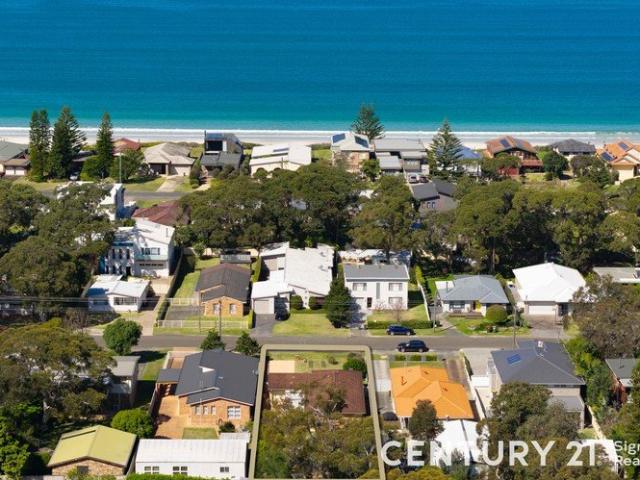 Affordable Coastal Living Just One Street from the Beach