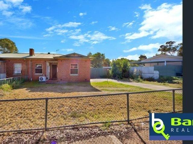 Affordable Duplex on a Generous Allotment