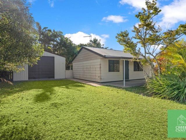 Affordable Half Acre Coastal Lifestyle Property with Privacy & Parkland at Your Back Door