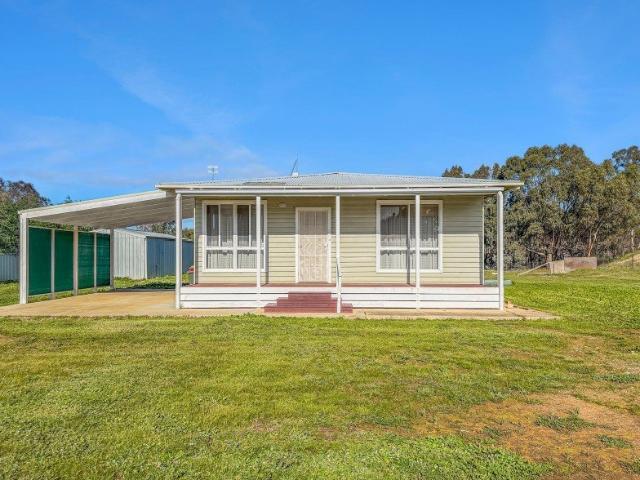 AFFORDABLE HOME ON ACREAGE