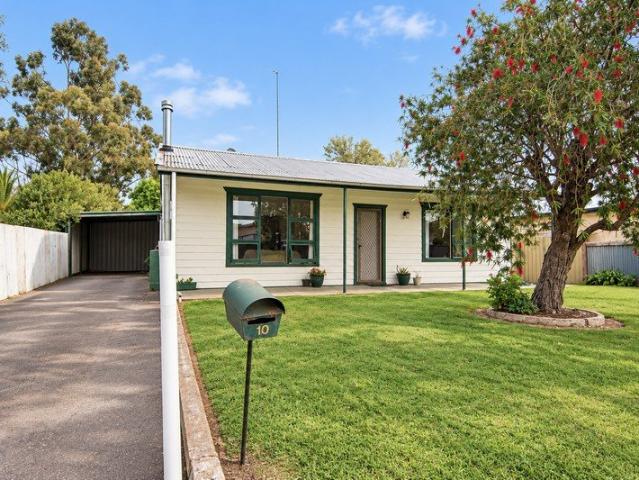 Affordable home with abundance of shedding