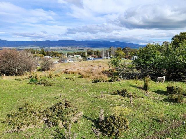 Affordable sunny house block with views and services
