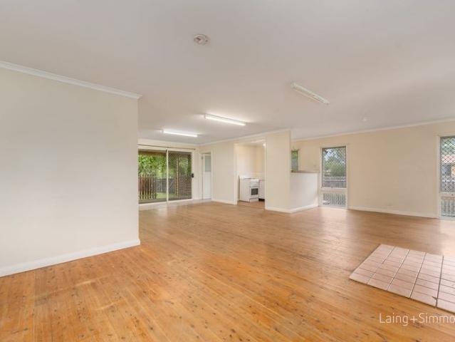 Affordable Two Bedroom Rental with Spacious Yard and Prime Location