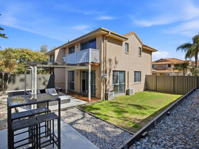 AFFORDABLE TOWNHOUSE WITH A BONUS. HUGE SIDE ACCESS