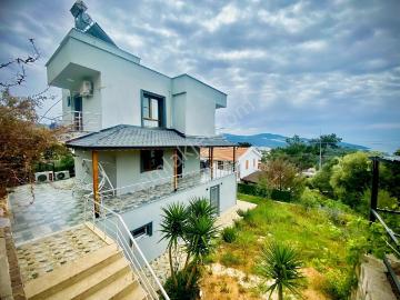 Akbükte Deniz Ve Doğa Manzaralı Satılık 5+2 Müstakil Villa