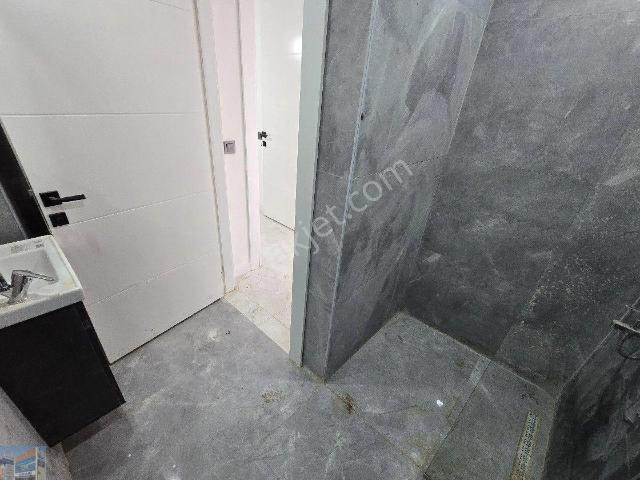 Akbük'te Havuzlu Site İçerisinde Deniz Manzaralı 2+1 Daire