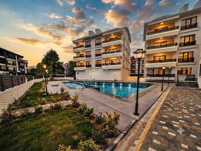 Aktif'ten Akçay'da Satılık Yüzme Havuzlu Otoparklı Arakat Harika 1+1 Daire