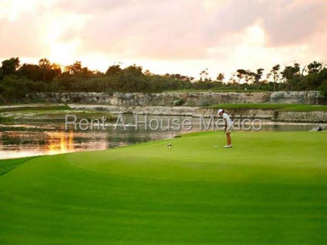 Akumal terreno en venta de 600 m2 en Tulum Country Club con golf y club de playa RAH2447