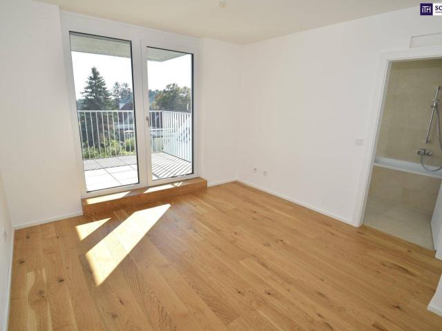 AH11 Familienfreundliche Dachgeschosswohnung mit drei Schlafzimmern und Süd Loggia