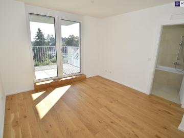 AH11' Familienfreundliche Dachgeschosswohnung mit drei Schlafzimmern und Süd Loggia