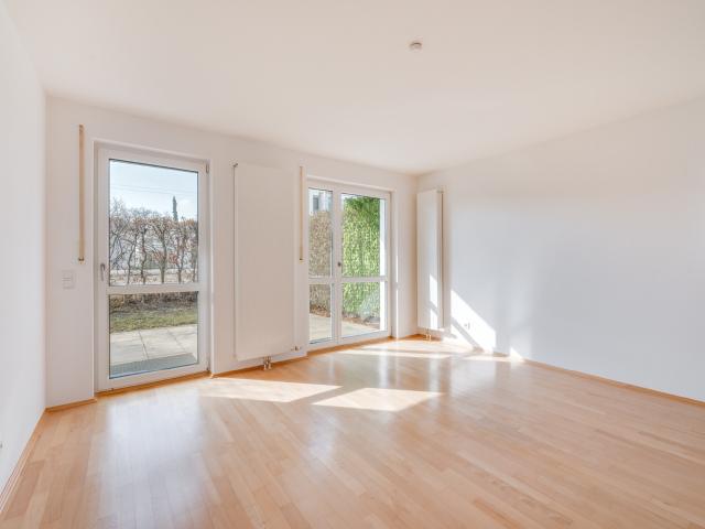 AIGNER Charmante Erdgeschosswohnung mit Gartenanteil