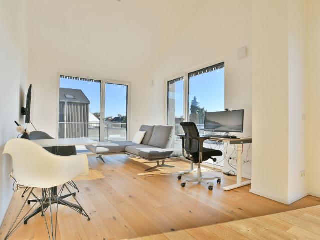 AIGNER Dachterrassentraum in Germering moderne 2 Zimmer Wohnung mit viel Freiraum