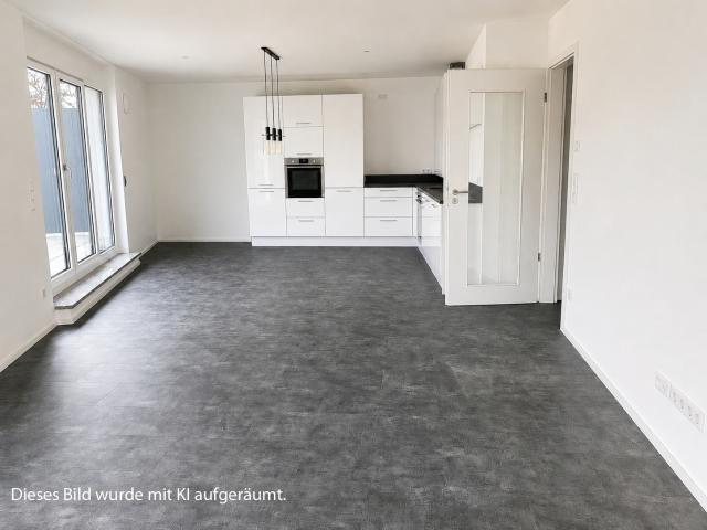 AIGNER Dachterrassenwohnung in Neufinsing: moderne Wohnqualität in guter Lage