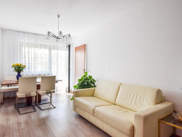 AIGNER Erbbaurecht: Charmante 1,5 Zimmer Wohnung mit Balkon und Tiefgaragenstellplatz
