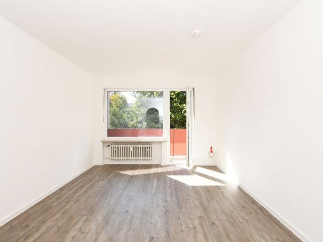 AIGNER Kompaktes Zuhause mit Balkon – hell, gemütlich und gut durchdacht