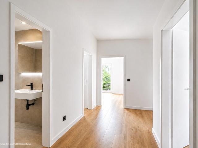 AIGNER Kernsanierte 2 Zimmer Wohnung mit Balkon in angenehm ruhiger Wohnlage