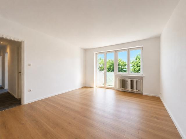 AIGNER Helle 3 Zimmer Dachgeschosswohnung in beliebter Lage Moosachs
