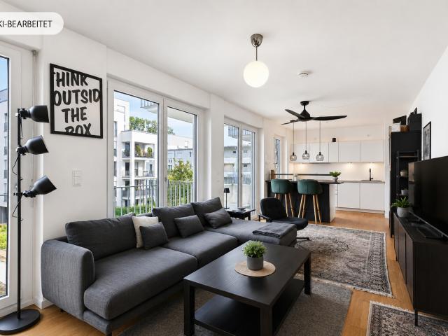 AIGNER Moderne 2 Zimmer Wohnung mit Süd West Balkon und ruhiger Innenhoflage