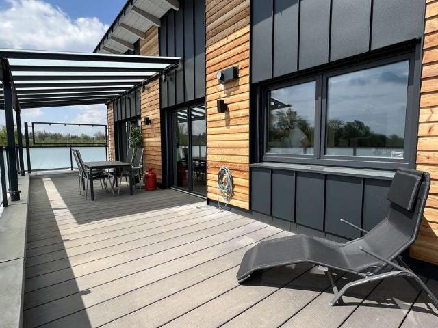 AIGNER modernes, geschmackvolles Penthouse mit Innblick und großer Dachterrasse.