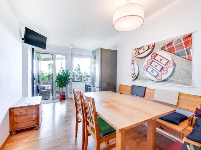 AIGNER Modernes Stadtleben trifft Architekturklassiker – 3 Zimmer mit Panorama