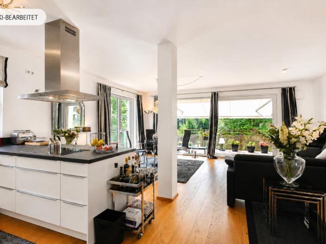 AIGNER Modernes Wohnen im Grünen: Lichtdurchflutete 3 Zimmer Wohnung mit großzügigem Westbalkon