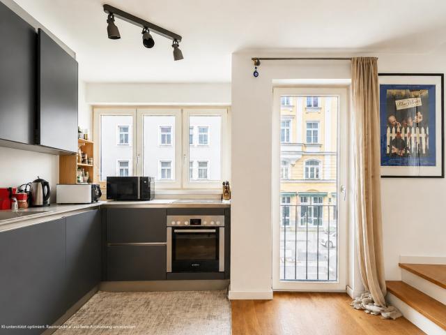 AIGNER Mitten in der Maxvorstadt: Helle 2 Zimmer Wohnung mit Westbalkon