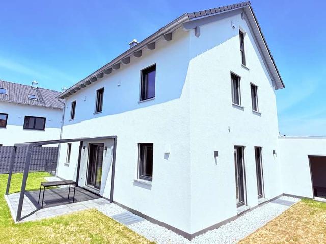 AIGNER Nachhaltiges Wohnen modernes Einfamilienhaus in ruhiger Lage.