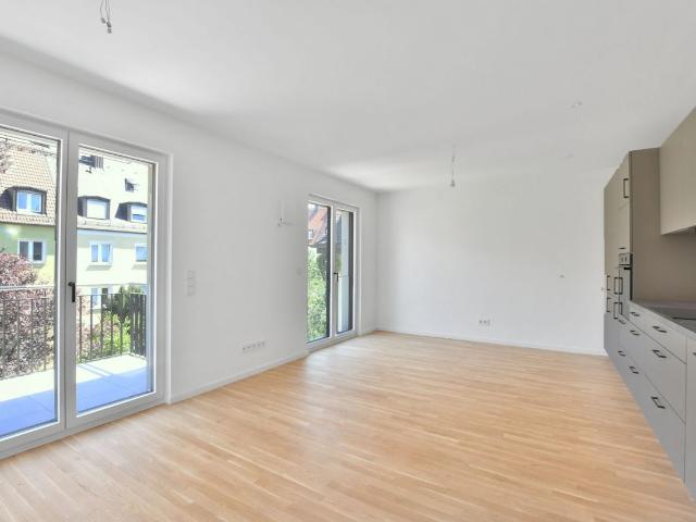 AIGNER Neubau Erstbezug Moderne 2,5 Zimmer Wohnung mit Einbauküche und Balkon in Obergiesing!