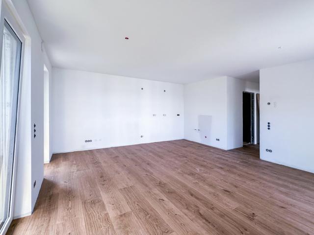 AIGNER Neubau: Großzügige und lichtdurchflutete 3 Zimmer Wohnung mit Balkon!