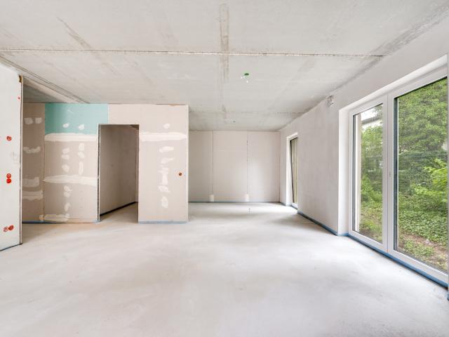 AIGNER Neubau: Großzügige und moderne 3 Zimmer Erdgeschosswohnung mit Terrasse!