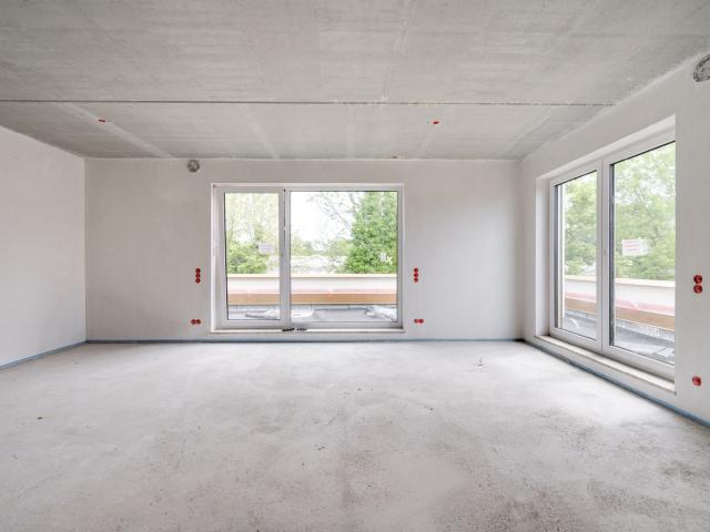AIGNER Neubau: Lichterfülltes Familiendomizil mit Dachterrasse im Münchner Nordwesten