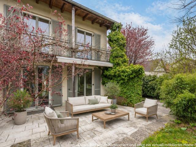 AIGNER Stilvolle Doppelhaushälfte mit Galerie, Gartenidylle und großzügigem Raumgefühl